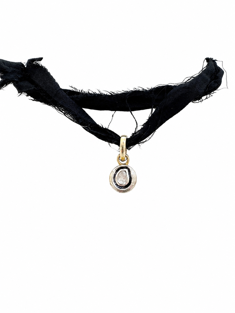 A black frayed fabric choker necklace with a small gold pendant featuring a clear teardrop gemstone, shown against a plain white background.